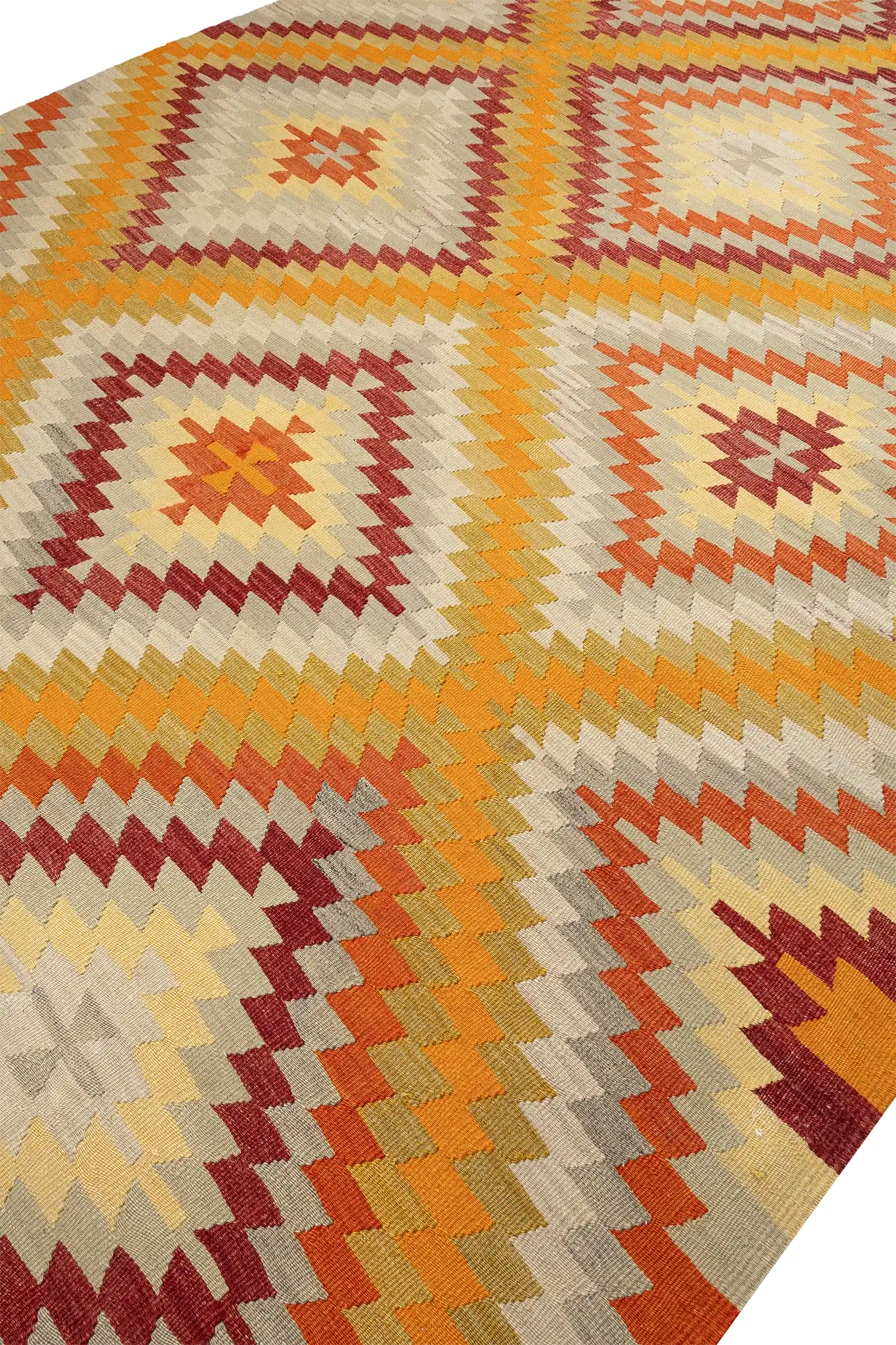 Schräge Seitenansicht des Kilims – zeigt die Tiefe und Struktur der ineinander verzahnten Muster im seitlichen Licht