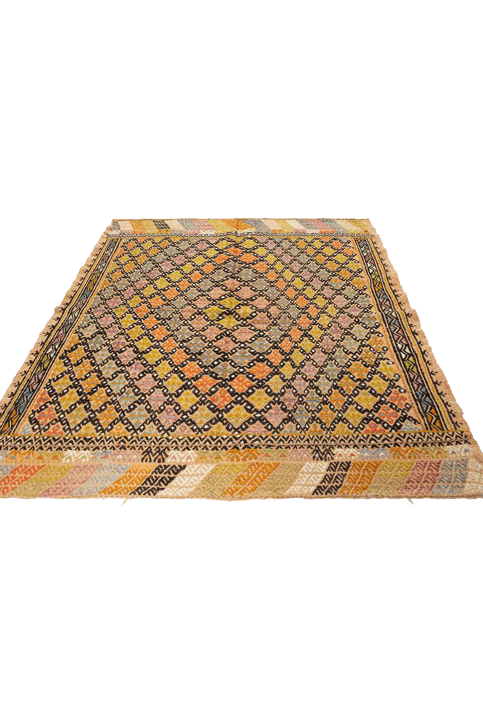 Seitlich aufgenommener Blick auf die Oberfläche des Kilims mit diagonaler Anordnung bunter, gepunkteter Rauten in satten Farben und leicht strukturiertem Gewebe.